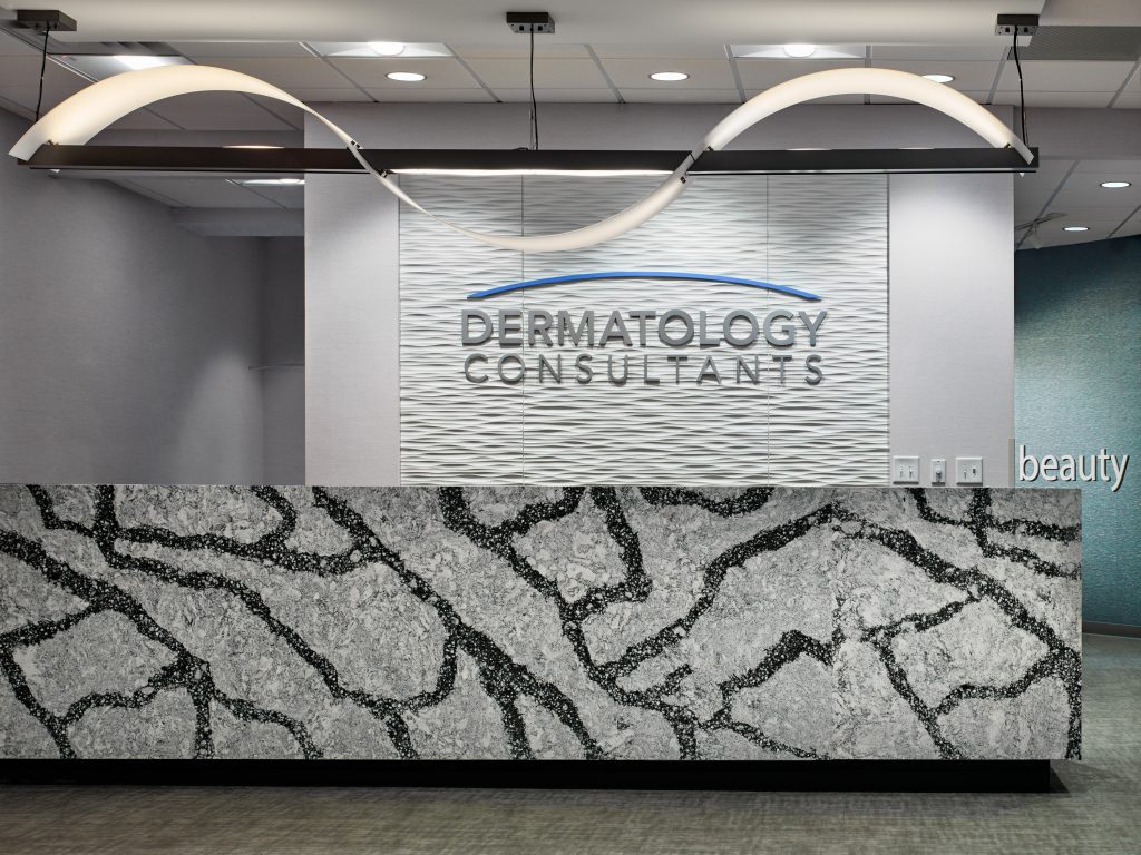 Front view of 3D Dermatology Consultants logo in waiting area