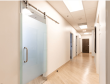 Modern privacy glass sliding doors in Reproductive Biology Associates Piedmont office