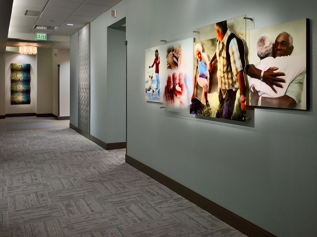 Kirkland Cancer Center corridor with 3D photo wall mountings and modern fixtures