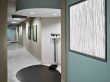 hallway in OBGYN of Atlanta with a scale and accent painting