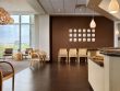 neurosurgery center waiting room with a brown accent wall, wall height windows and a check-in counter