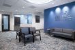 waiting room for Peachtree Women's clinic with a blue logo wall